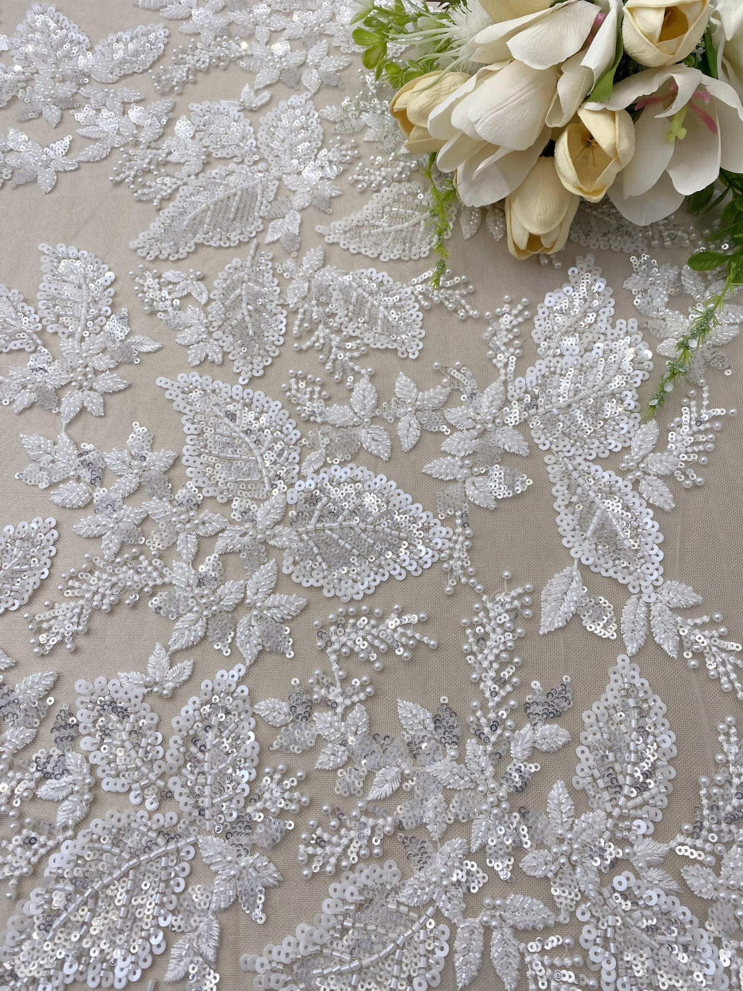Floral embroidered beaded lace fabric with sequins on soft tulle for wedding dresses, veils, bridal gowns, capes, luxury wedding gown fabric