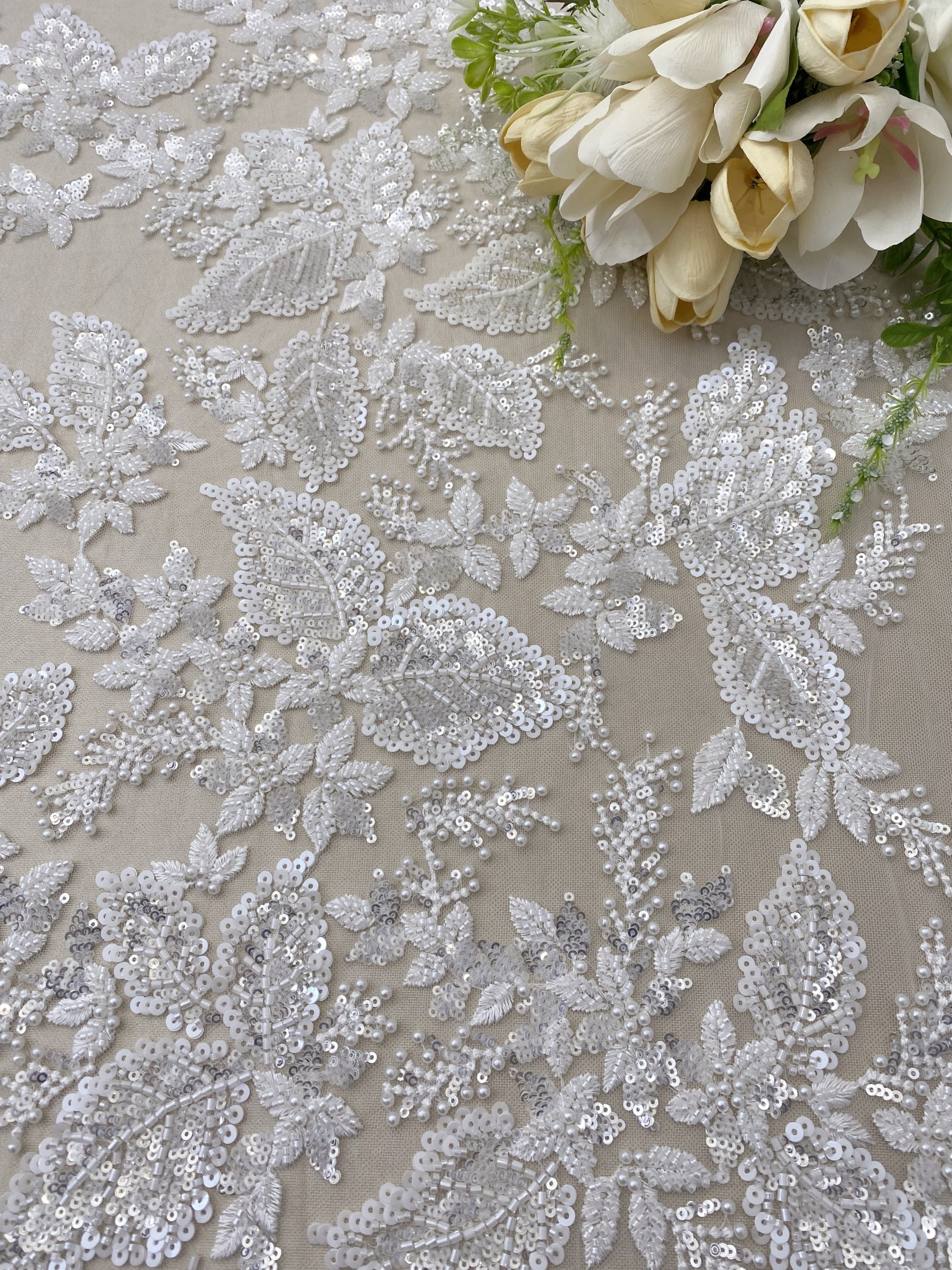 Floral embroidered beaded lace fabric with sequins on soft tulle for wedding dresses, veils, bridal gowns, capes, luxury wedding gown fabric
