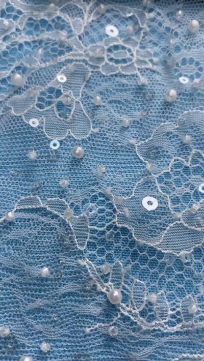 Ivory Fabric with Exquisite Floral Embroidery! Features Delicate Leaf Patterns, Perfect for Wedding Dresses/Chic Evening Wear. Premium Craft—Shop Now!