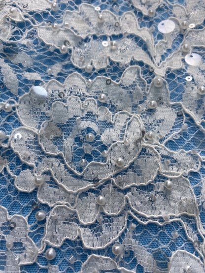 Ivory Lace Fabric Embellished with Pearls & Sparkling Sequins! Features Intricate Patterns, Ideal for Wedding Dresses/Evening Wear. Premium Quality—Shop Now!