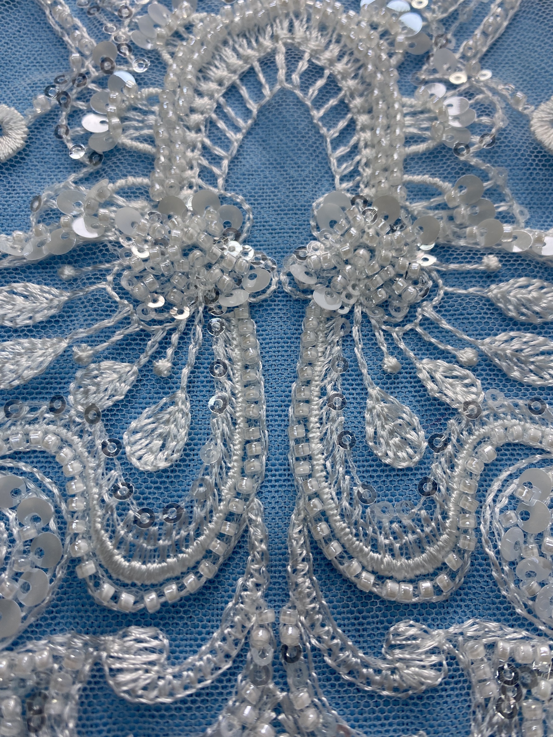 Gorgeous Ivory Fabric! Adorned with Intricate Embroidery, Sparkling Sequins & Beads. Ideal for Wedding Dresses/Evening Wear. Premium Craftsmanship—Shop This Exquisite Material Now!
