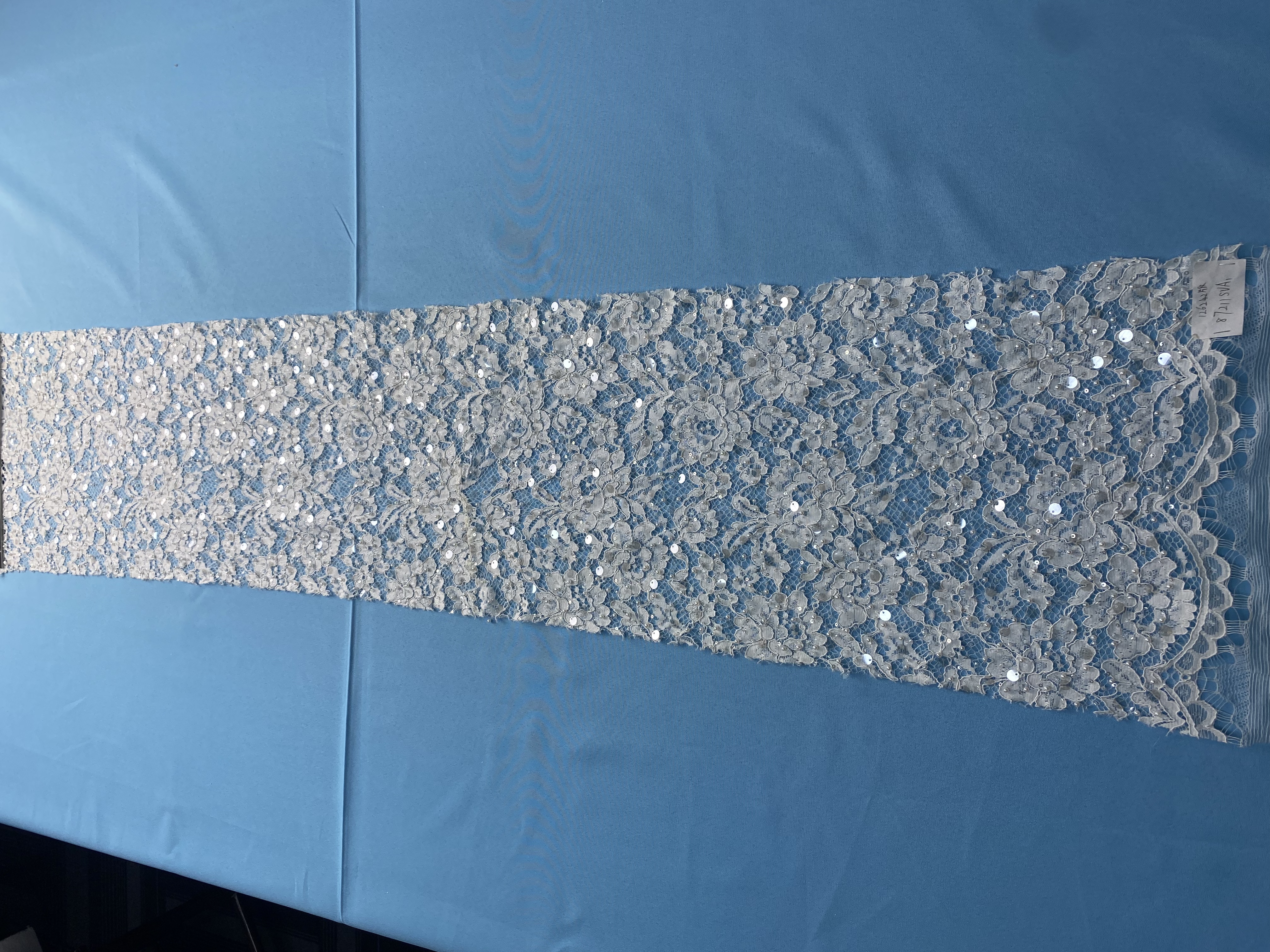 Ivory Lace Fabric Embellished with Pearls & Sparkling Sequins! Features Intricate Patterns, Ideal for Wedding Dresses/Evening Wear. Premium Quality—Shop Now!