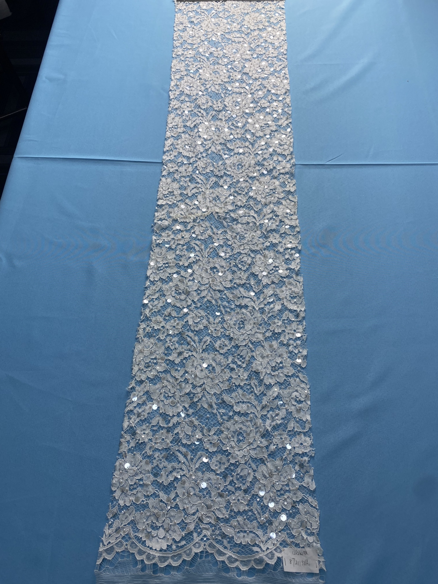 Ivory Lace Fabric Embellished with Pearls & Sparkling Sequins! Features Intricate Patterns, Ideal for Wedding Dresses/Evening Wear. Premium Quality—Shop Now!