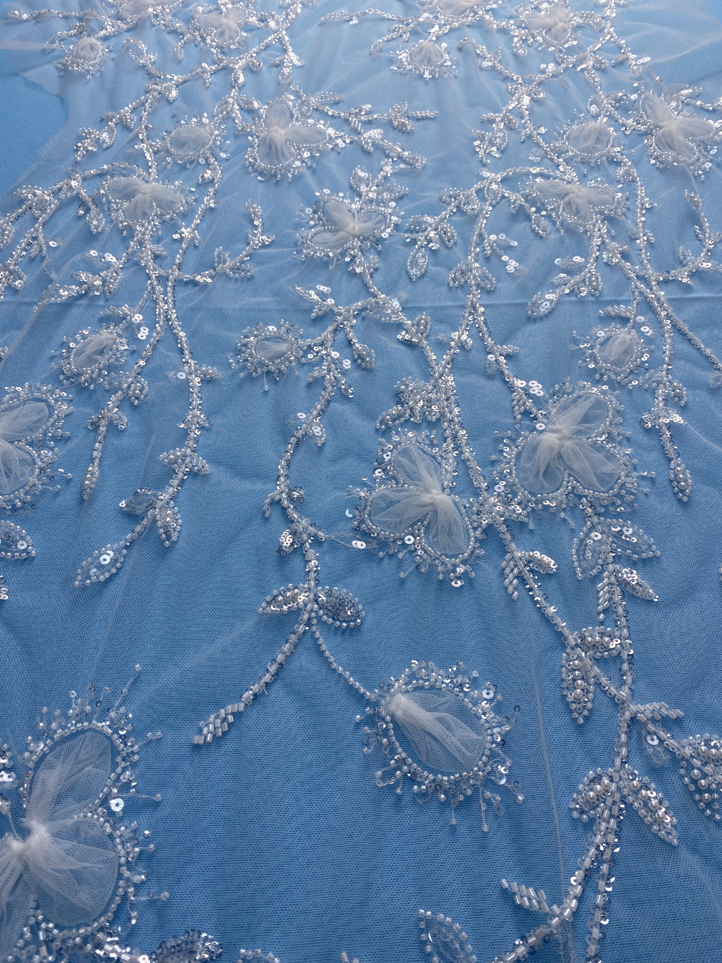 Ivory Fabric! Embellished with Sparkling Sequins, Beads & Delicate Floral Embroidery. Ideal for Wedding Dresses/Chic Evening Wear—Premium Craftsmanship, Shop Now!