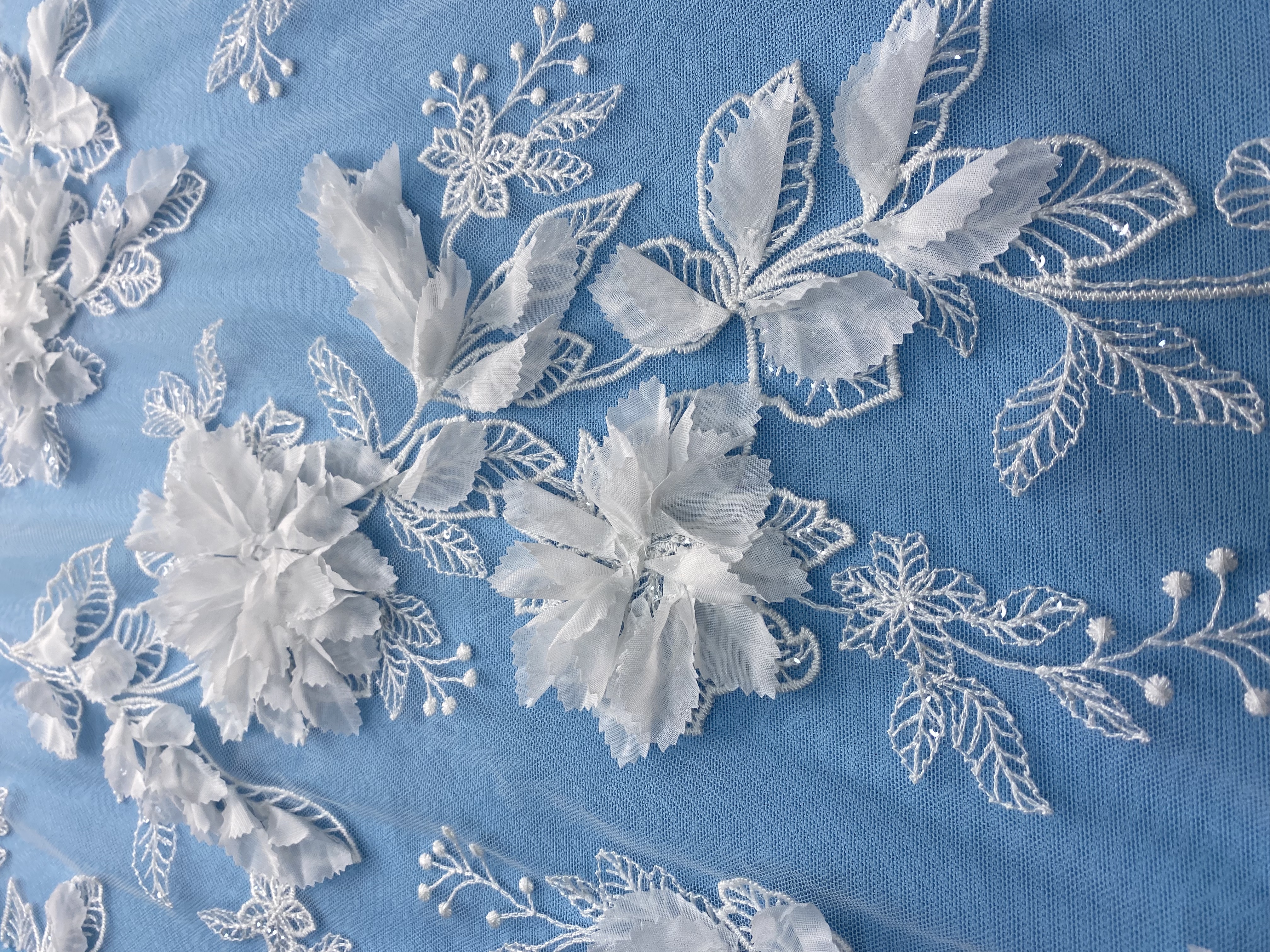 Ivory Fabric with Gorgeous 3D Flower Embroidery! Features Delicate Leaf Detailing, Perfect for Wedding Dresses/Elegant Evening Wear. Premium Craft—Shop Now!