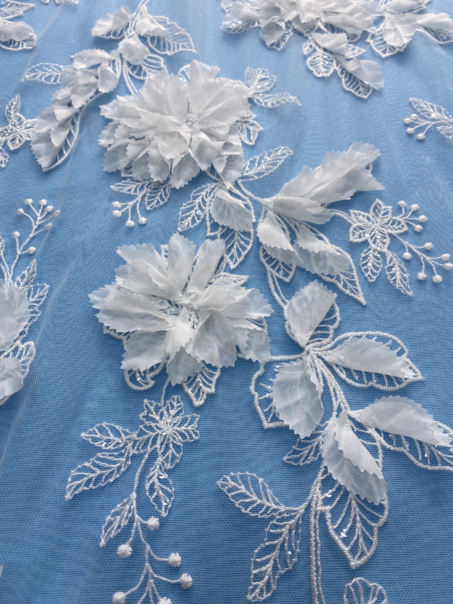 Ivory Fabric with Gorgeous 3D Flower Embroidery! Features Delicate Leaf Detailing, Perfect for Wedding Dresses/Elegant Evening Wear. Premium Craft—Shop Now!