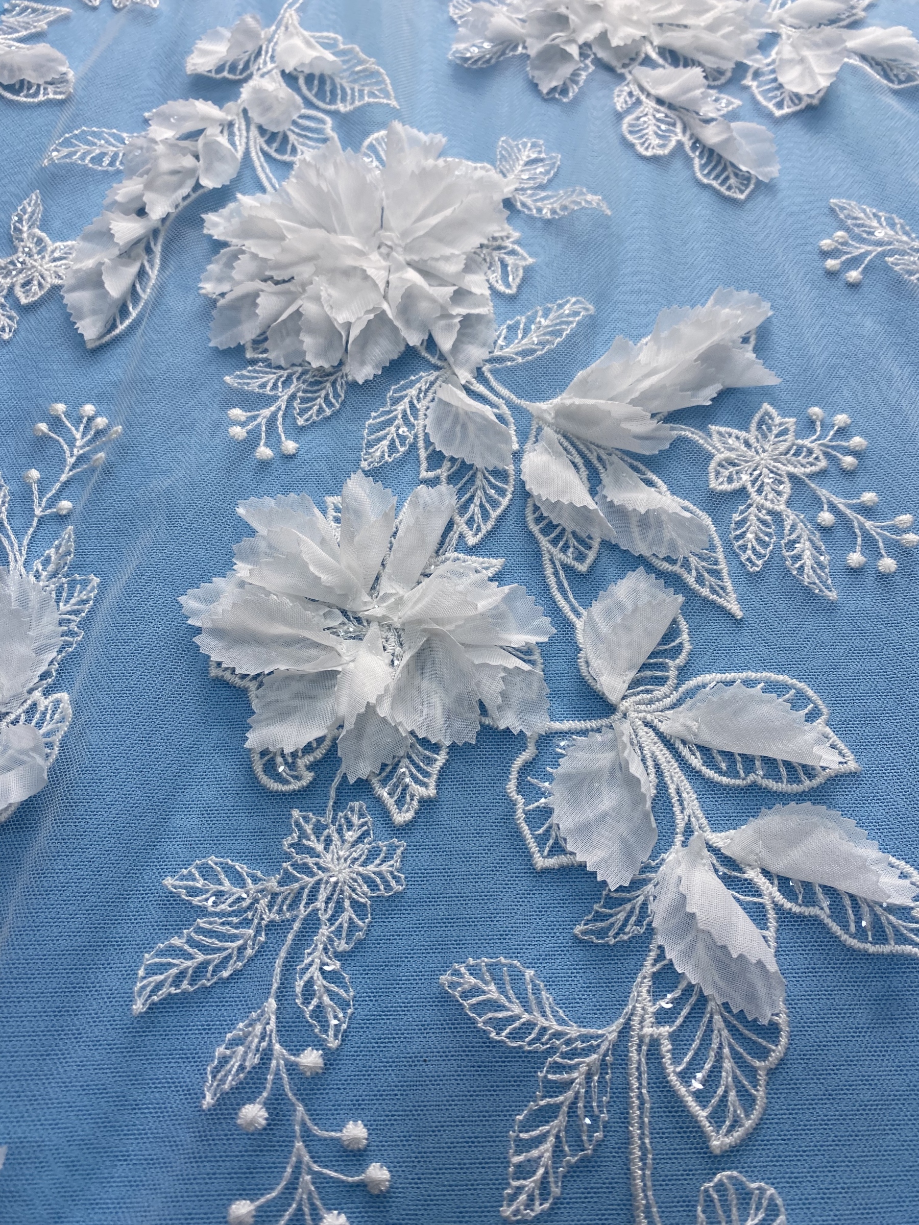 Ivory Fabric with Gorgeous 3D Flower Embroidery! Features Delicate Leaf Detailing, Perfect for Wedding Dresses/Elegant Evening Wear. Premium Craft—Shop Now!