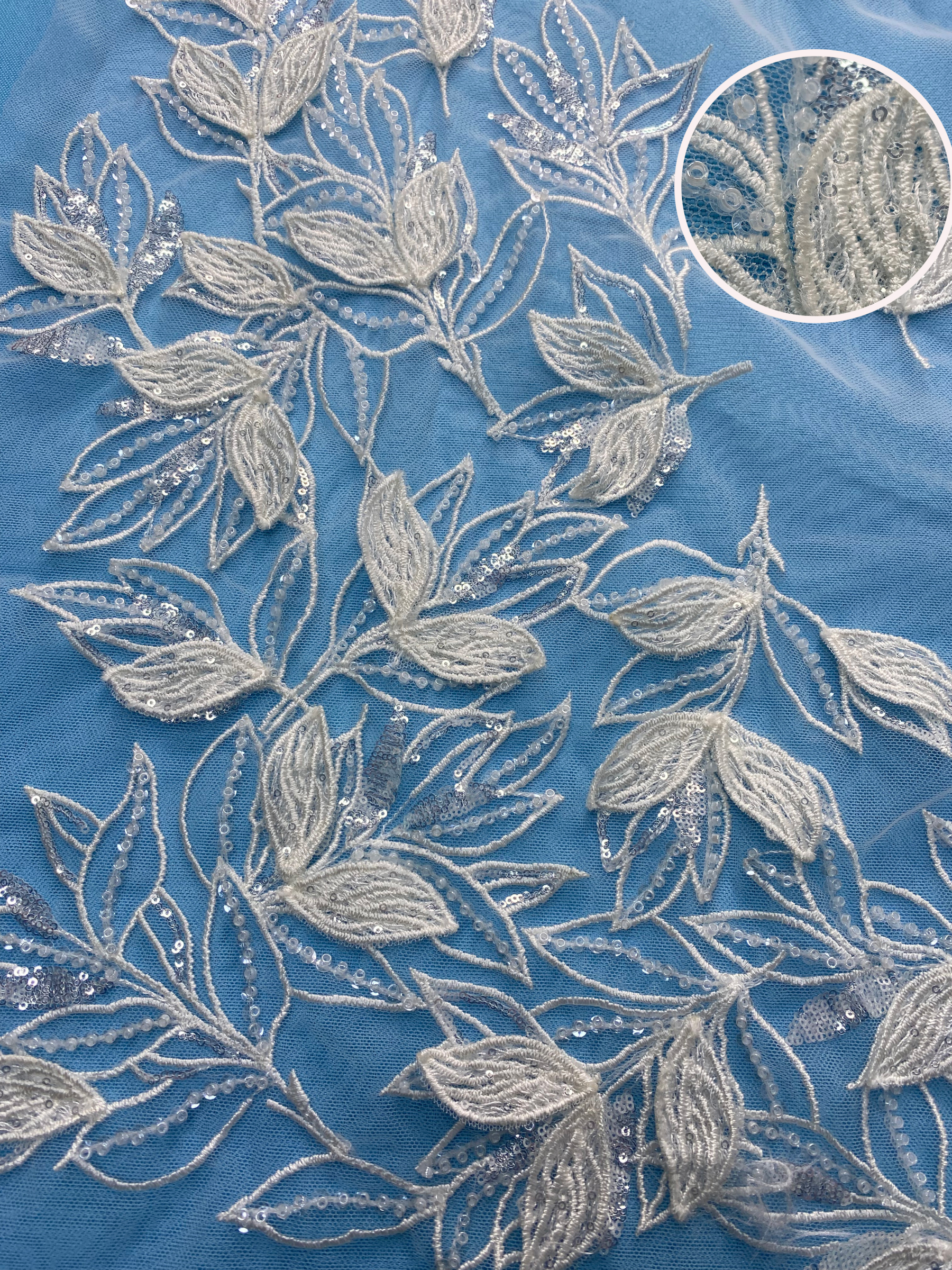 Ivory Tulle Fabric! Adorned with Delicate Leaf Embroidery & Sparkling Sequins. Ideal for Wedding Dresses/Elegant Garments. High-Quality Craftsmanship—Shop This Stunning Material Now!