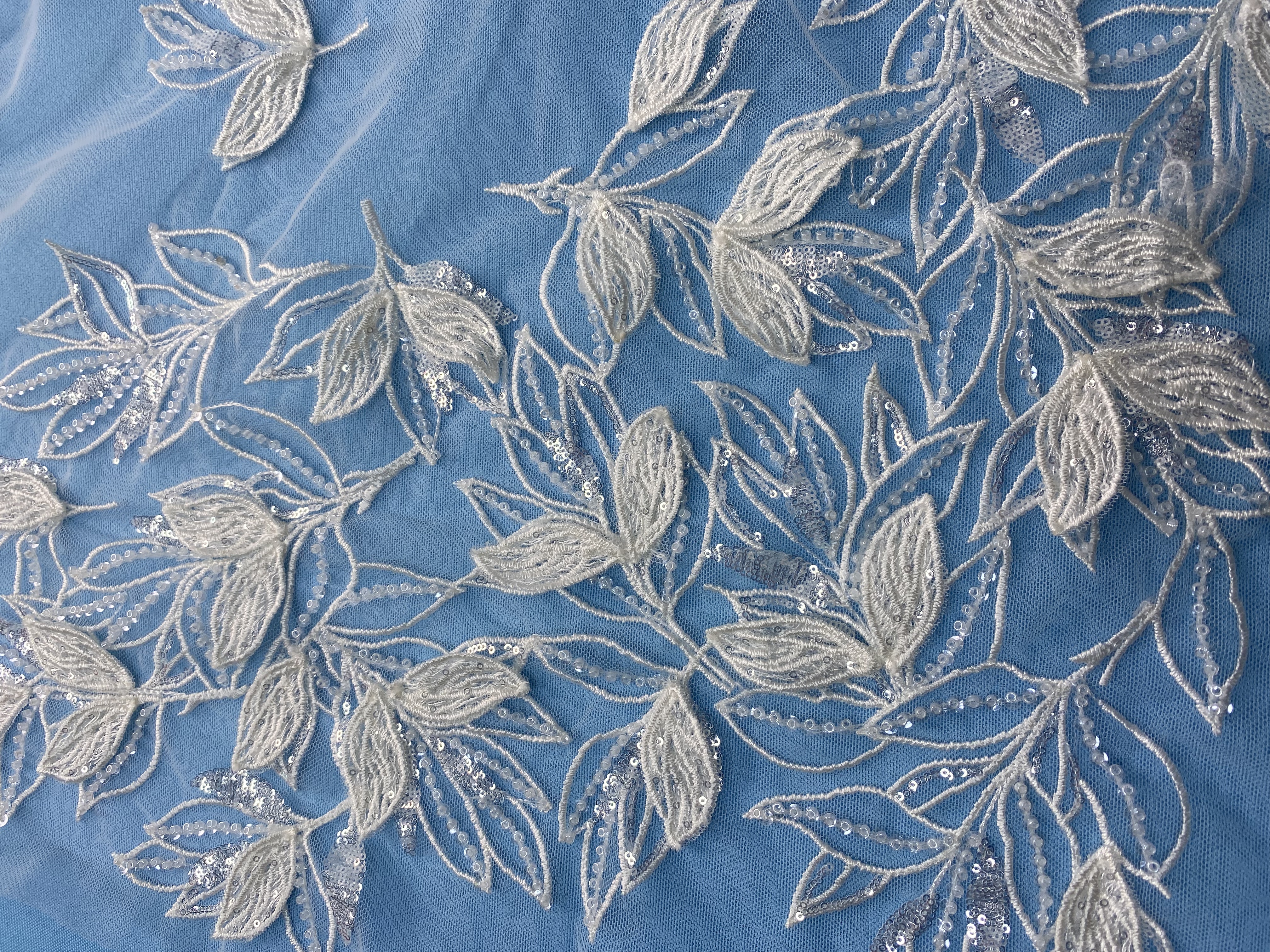 Ivory Tulle Fabric! Adorned with Delicate Leaf Embroidery & Sparkling Sequins. Ideal for Wedding Dresses/Elegant Garments. High-Quality Craftsmanship—Shop This Stunning Material Now!