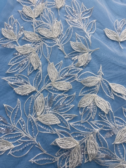 Ivory Tulle Fabric! Adorned with Delicate Leaf Embroidery & Sparkling Sequins. Ideal for Wedding Dresses/Elegant Garments. High-Quality Craftsmanship—Shop This Stunning Material Now!