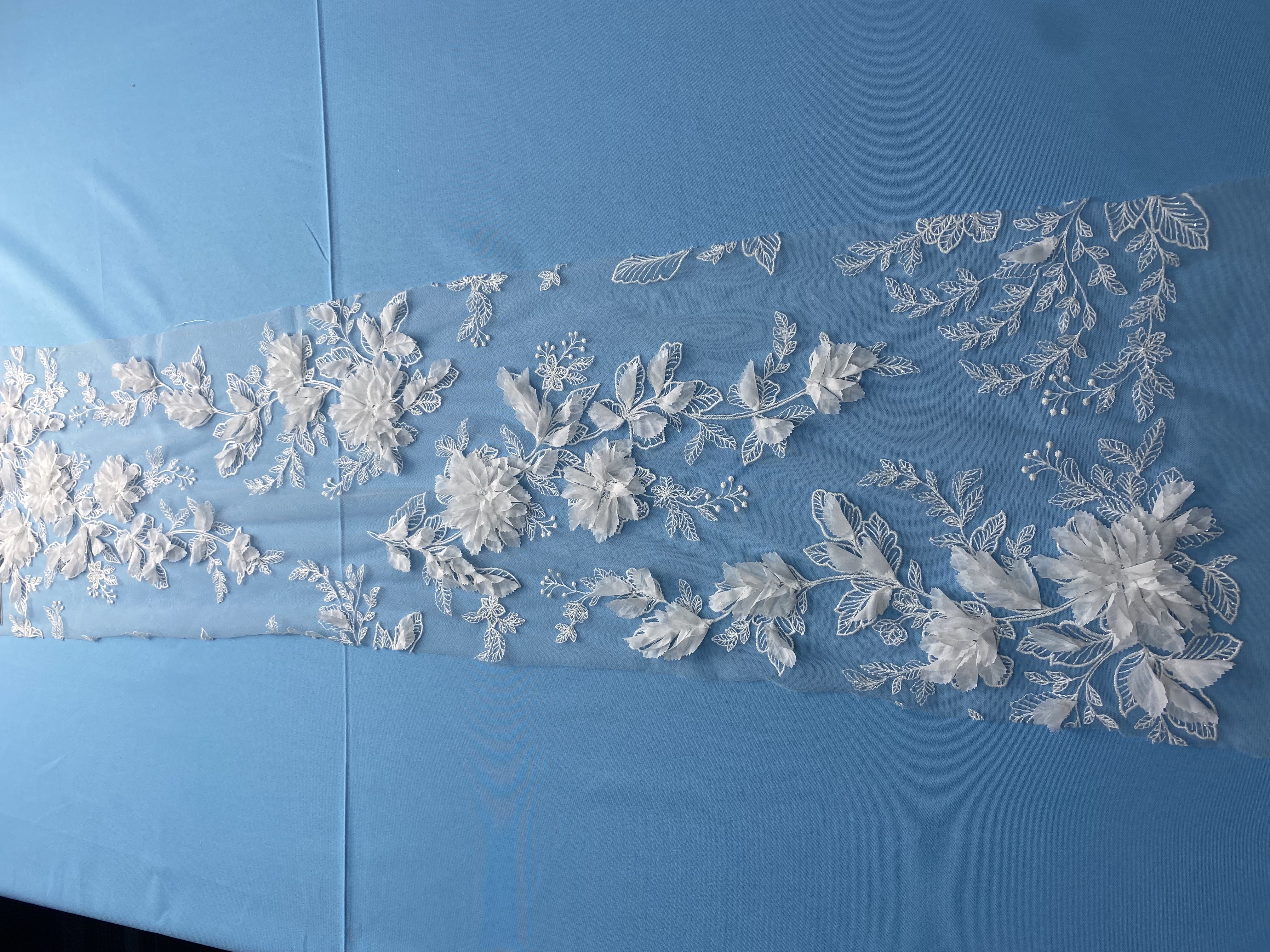 Ivory Fabric with Gorgeous 3D Flower Embroidery! Features Delicate Leaf Detailing, Perfect for Wedding Dresses/Elegant Evening Wear. Premium Craft—Shop Now!