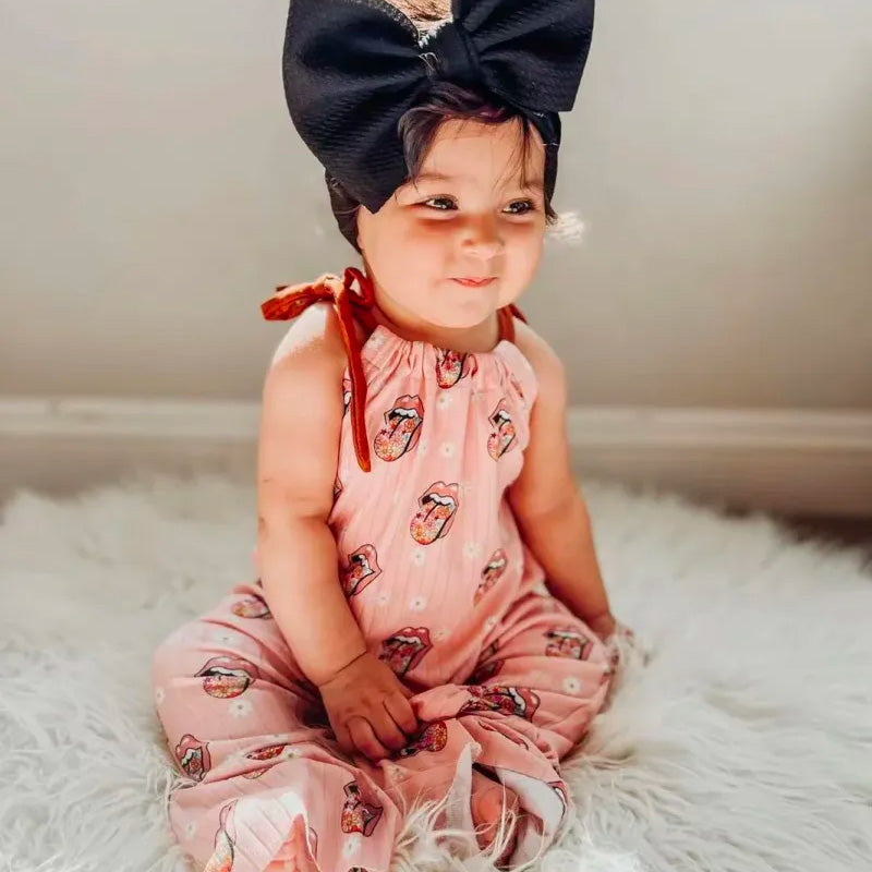 Baby Rolling Stone Print Romper.