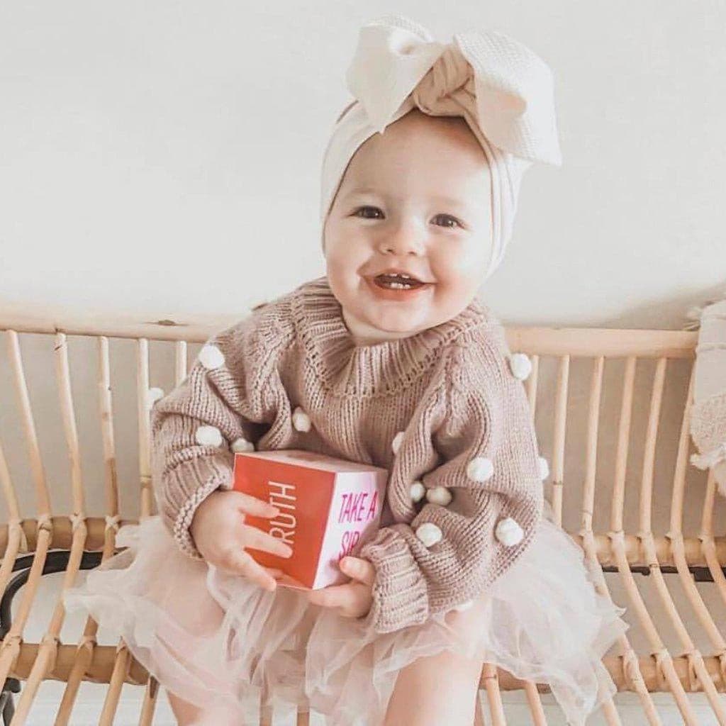 Baby Dot lovely sweater.