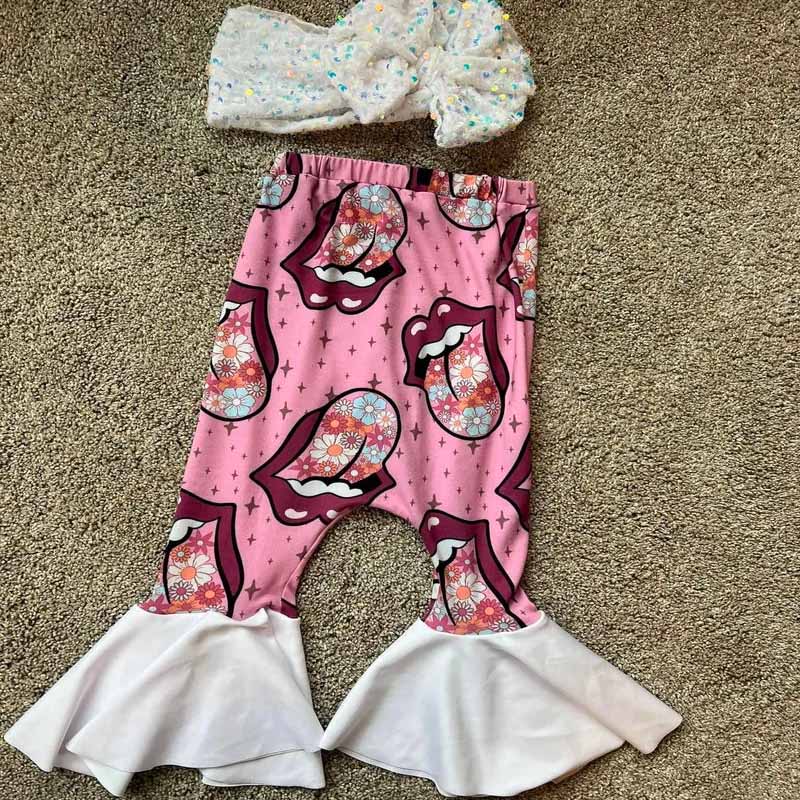 Baby Rolling Stone Print Romper.