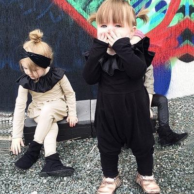 Long-sleeved cotton romper.