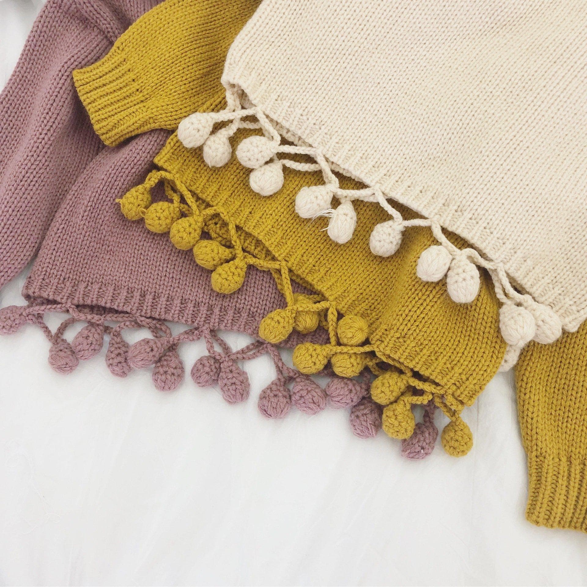 Baby Lovely ball Sassy White Sweater.