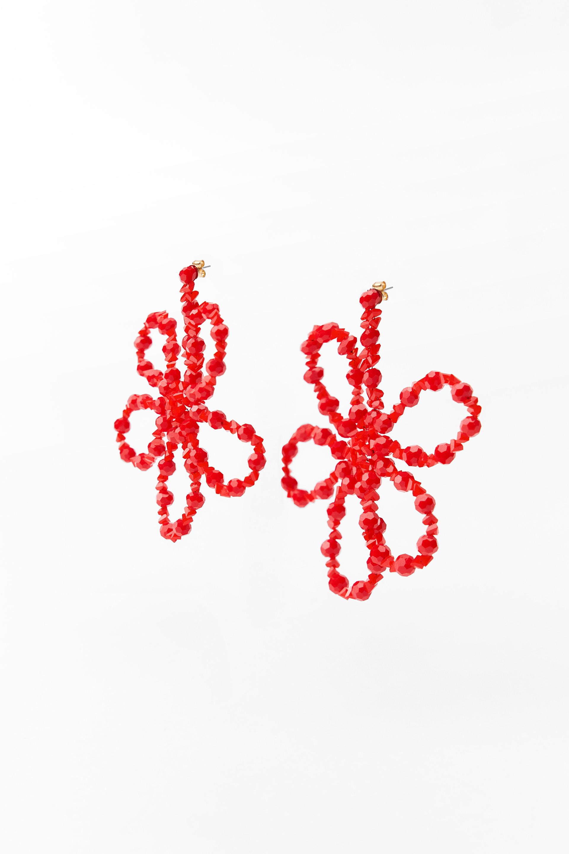 Flower shaped metal drop earrings with colorful bead appliqu. Butterfly closure.