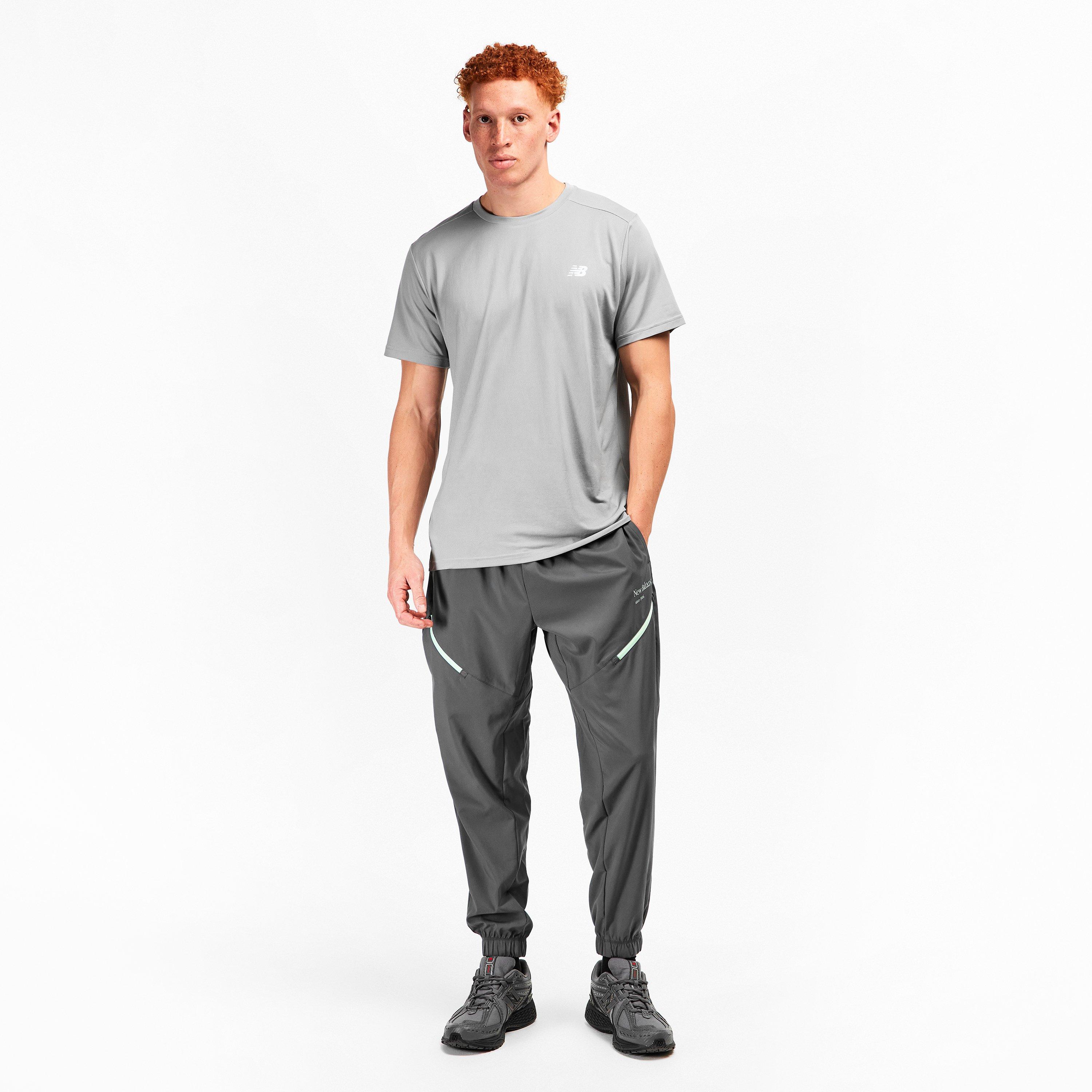 New Balance Men's Closed Hem Woven Joggers Graphite
