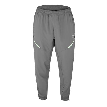New Balance Men's Closed Hem Woven Joggers Graphite