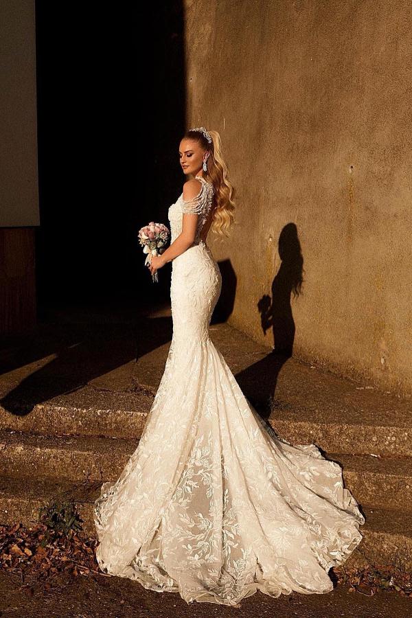 Off the shoulder keywhole mermaid wedding dress with lace appliques