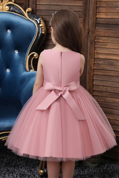 Dusty pink sleeveless knee length belt flower girl dress