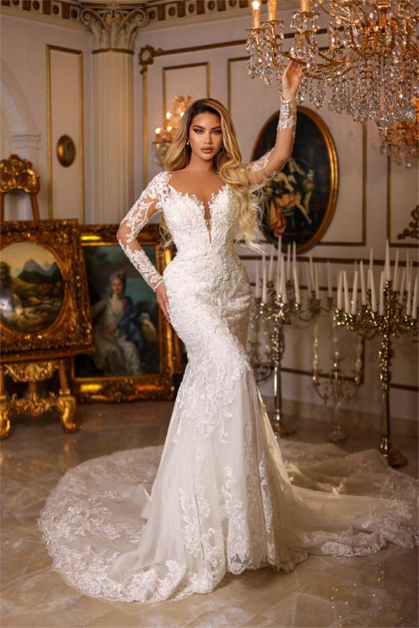 Sweetheart mermaid long sleeve lace wedding dress with a train