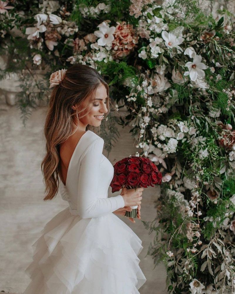 Long sleeves low back white ruffles wedding dress with court train