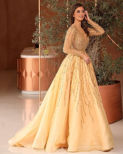 Gold long sleeves v-neck a-line floor length evening dress