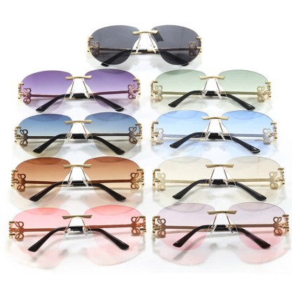 Spykay™ SG60909 Fashion Y2K Rimless Hollow-out Aviator Sunglasses