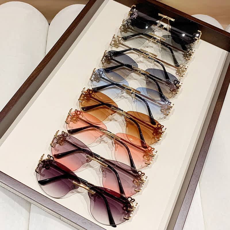 Spykay™ SG60909 Fashion Y2K Rimless Hollow-out Aviator Sunglasses