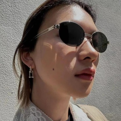 Spykay™ SG60778 Retro Fashion Oval Frame Hollow-out Temples Semi-Rimless Sunglasses with Nylon Lenses