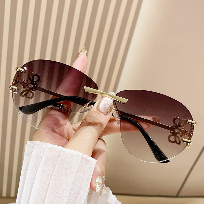Spykay™ SG60909 Fashion Y2K Rimless Hollow-out Aviator Sunglasses