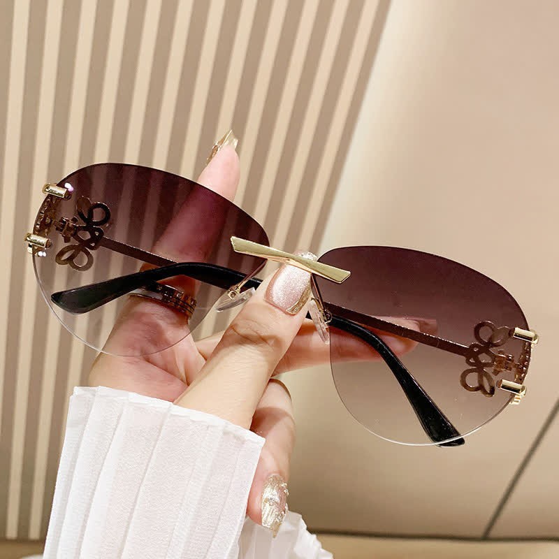 Spykay™ SG60909 Fashion Y2K Rimless Hollow-out Aviator Sunglasses