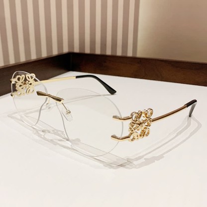 Spykay™ SG60909 Fashion Y2K Rimless Hollow-out Aviator Sunglasses