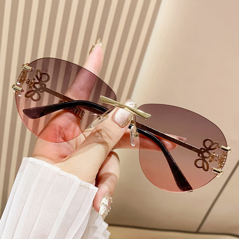 Spykay™ SG60909 Fashion Y2K Rimless Hollow-out Aviator Sunglasses