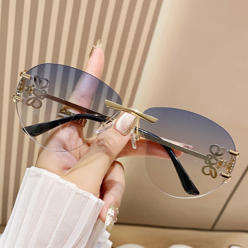 Spykay™ SG60909 Fashion Y2K Rimless Hollow-out Aviator Sunglasses