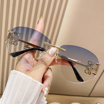 Spykay™ SG60909 Fashion Y2K Rimless Hollow-out Aviator Sunglasses