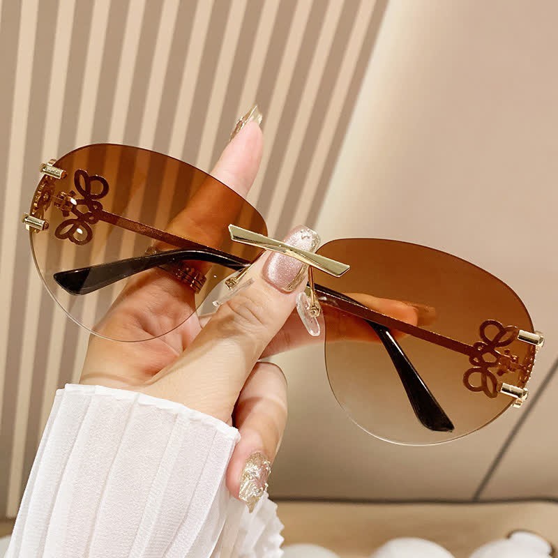Spykay™ SG60909 Fashion Y2K Rimless Hollow-out Aviator Sunglasses