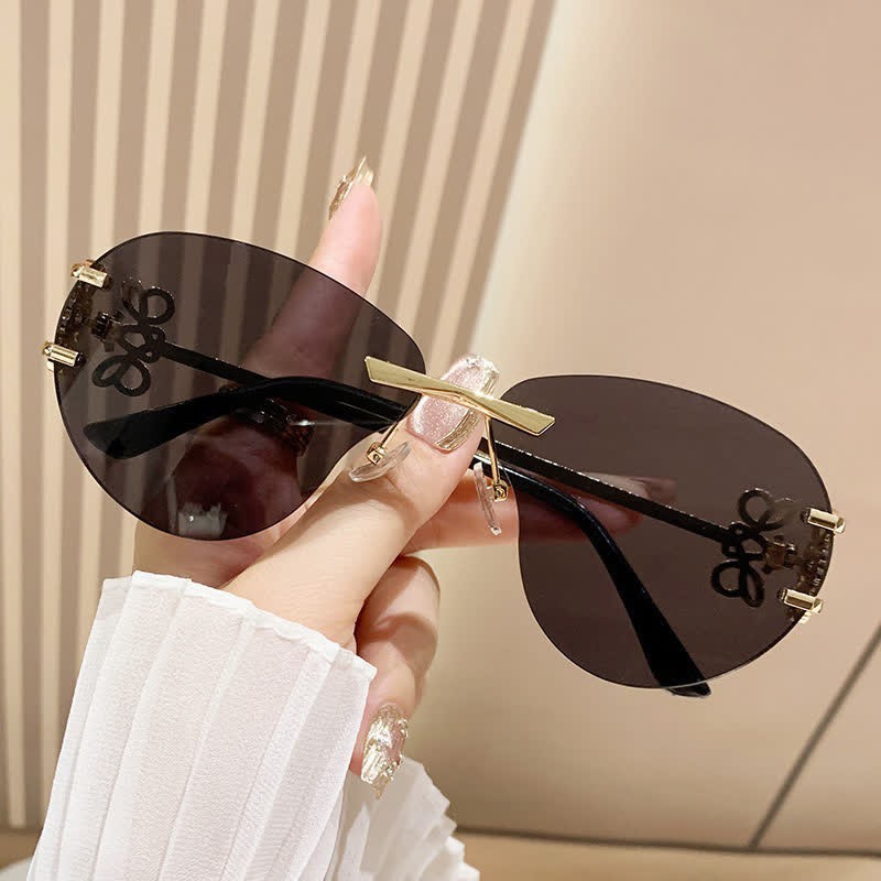 Spykay™ SG60909 Fashion Y2K Rimless Hollow-out Aviator Sunglasses