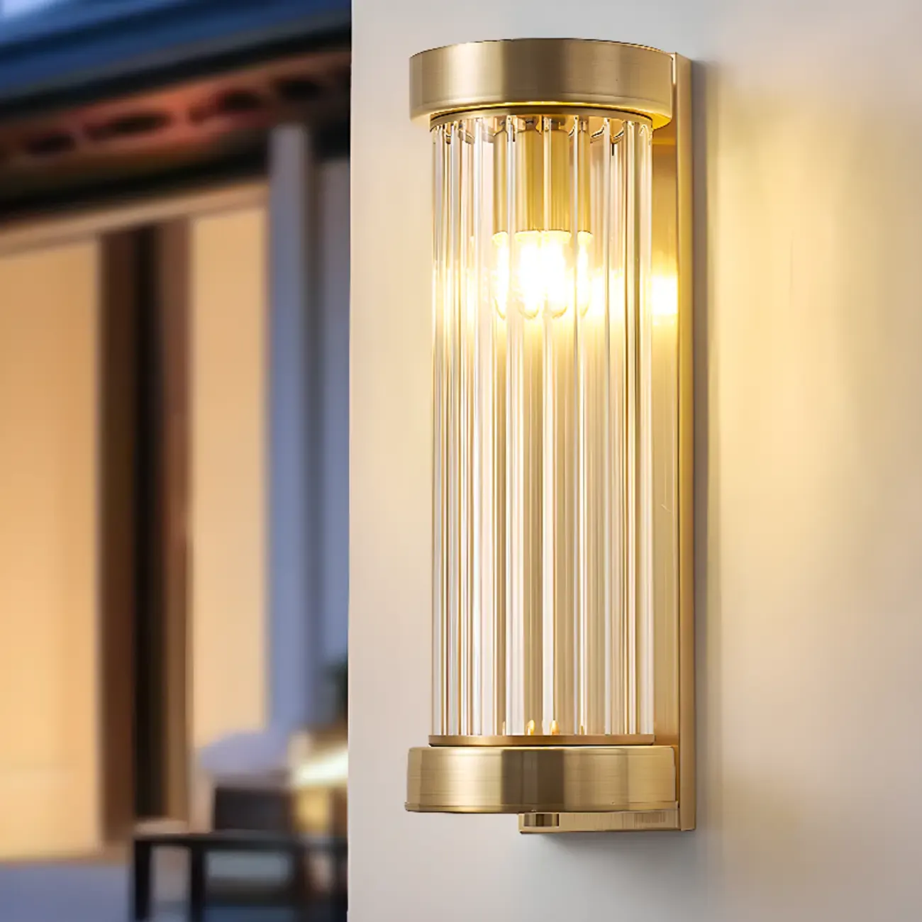 Modern Outdoor Cylinder Wall Sconce with Clear Shade Image - 1