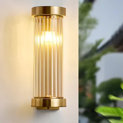 Modern Outdoor Cylinder Wall Sconce with Clear Shade Image - 6