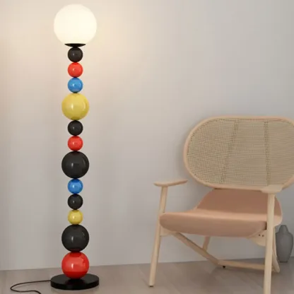 Globe Glass Shade Floor Lamp with Stacked Colorful Balls Image - 1