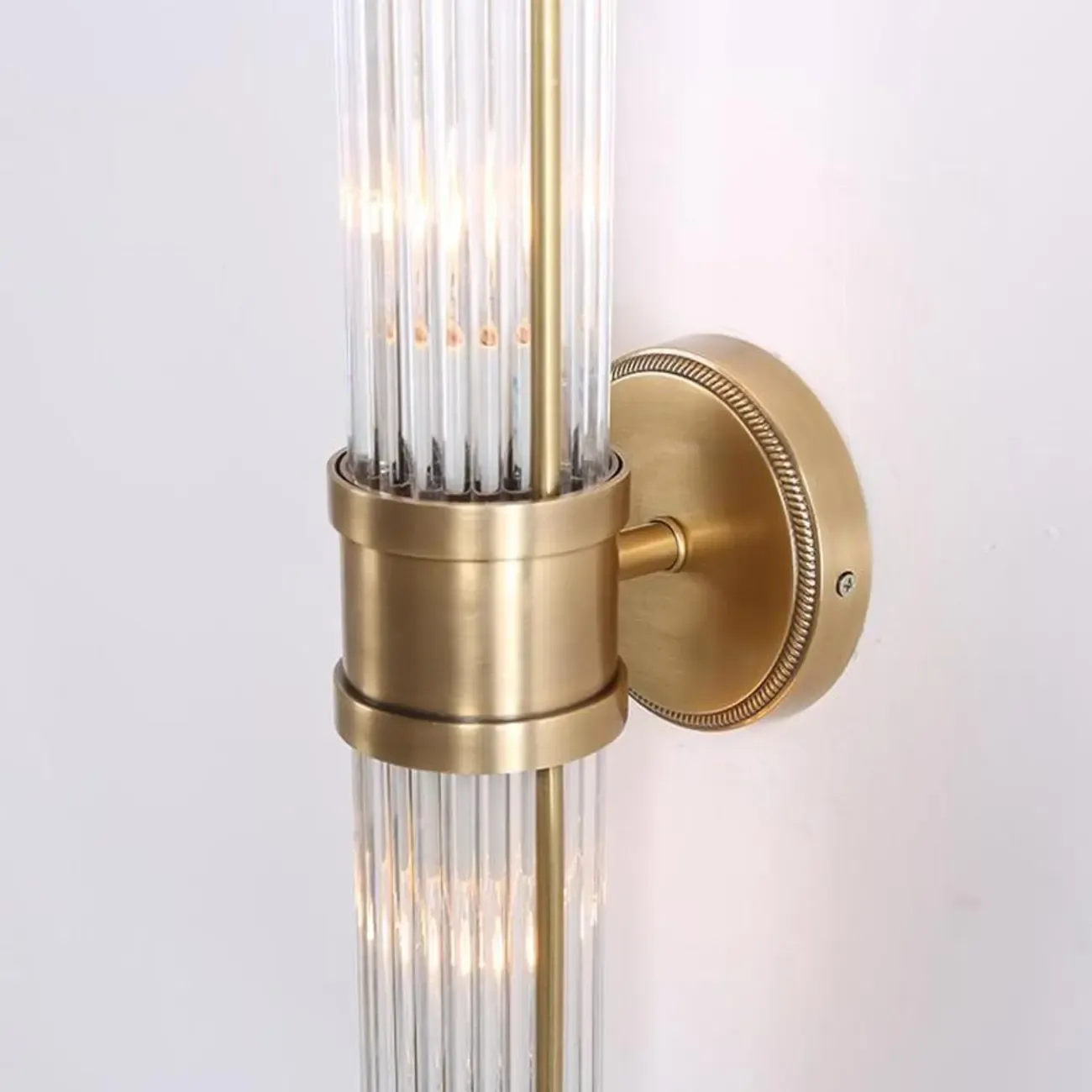 Modern Brass Metal Cylinder Wall Lamp with Clear Glass for Bedside Image - 6
