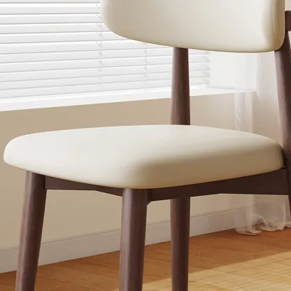 Scandinavian Faux Leather Dining Chair with Wooden Frame and Curved Back Image - 7