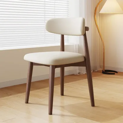 Scandinavian Faux Leather Dining Chair with Wooden Frame and Curved Back Image - 9