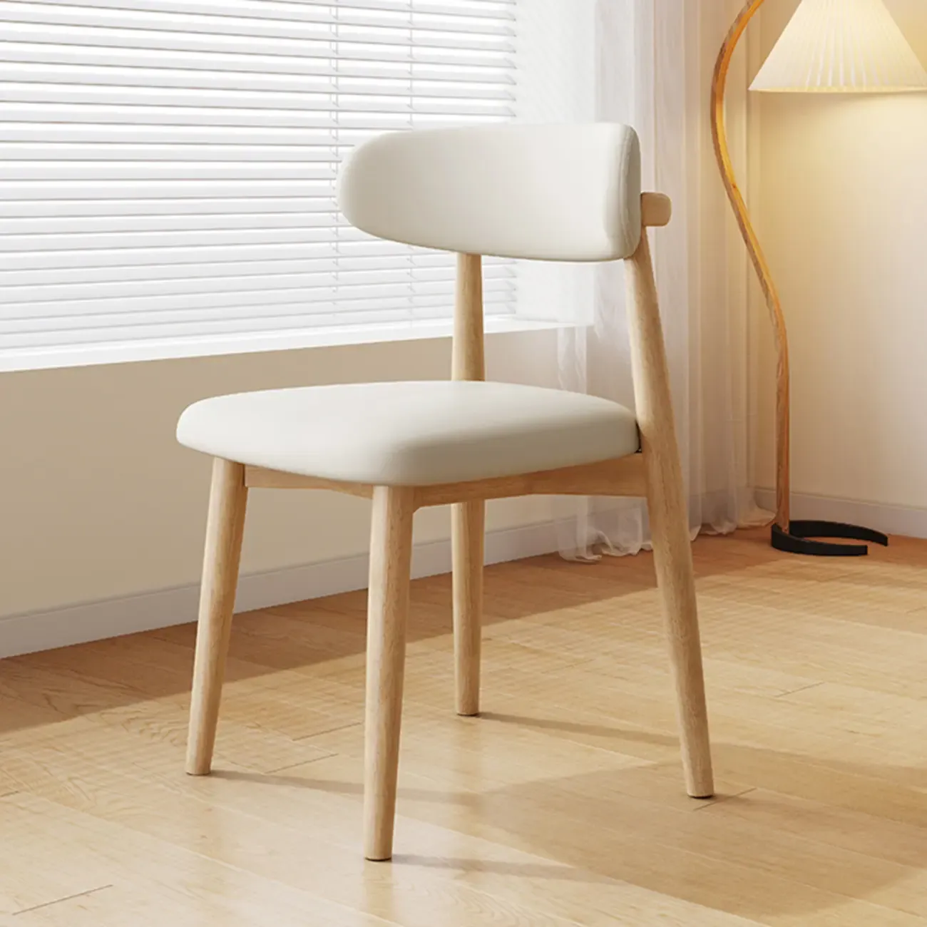 Scandinavian Faux Leather Dining Chair with Wooden Frame and Curved Back Image - 10