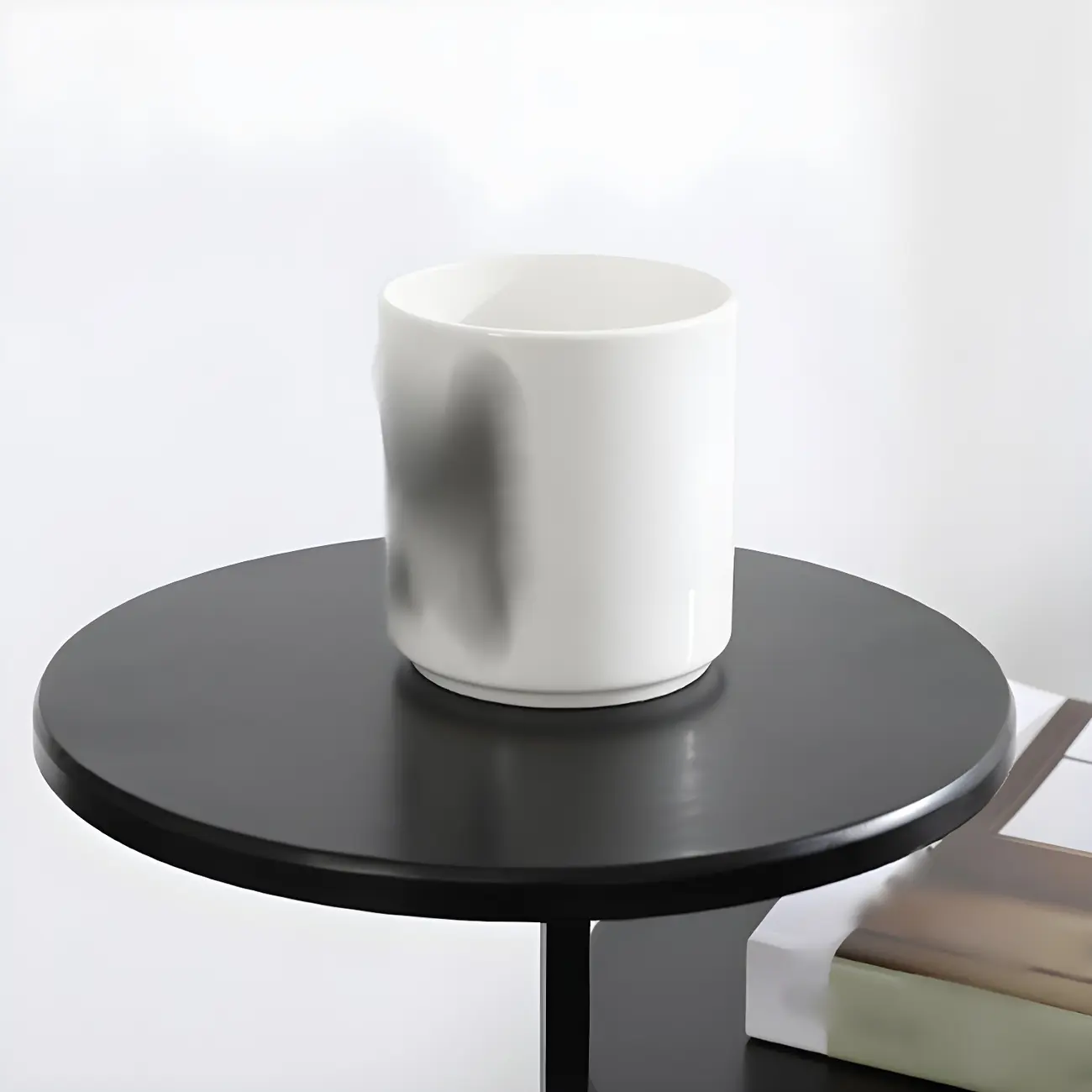 Minimalist Round Metal Bedside Table in Black without Storage Image - 7 | homeyfad