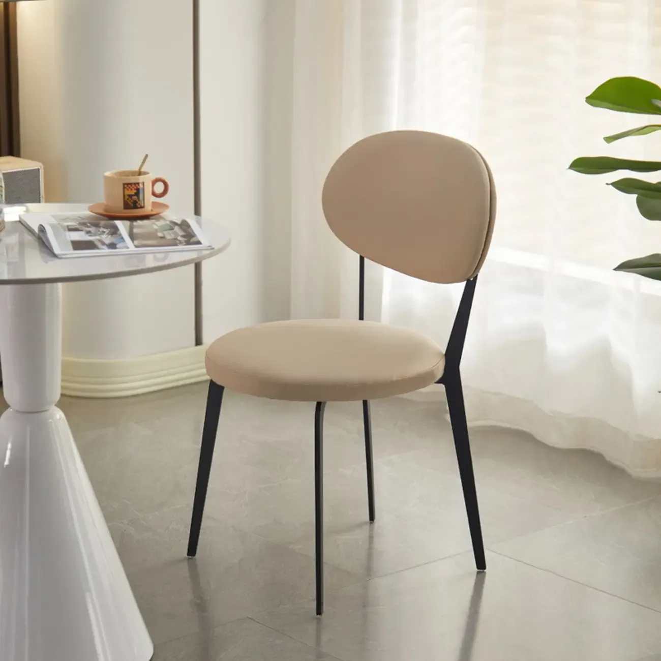 Minimalist Round Faux Leather Upholstered Metal Dining Chair Image - 3