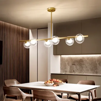 Gold Linear Island Light with 6 Lights Transparent Glass Globe Shades Image - 1