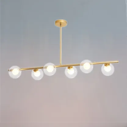 Gold Linear Island Light with 6 Lights Transparent Glass Globe Shades Image - 6